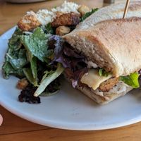 Turkey and Brie sandwich w/ Caesar salad at Watercourse Foods in Denver