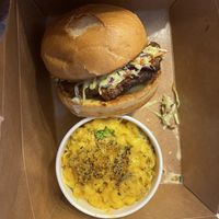 Hot chicken sandwich, really good. It’s kind of a dry rub lightly fried sandwich with bbq sauce and coleslaw. Needs some extra sauce. I got ranch but hot sauce would be good too. at Watercourse Foods in Denver