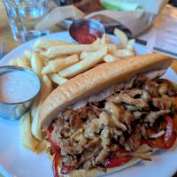 Philly sandwich and fries at Watercourse Foods in Denver