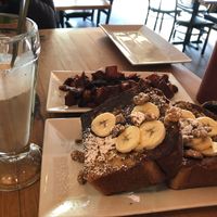 French toast, chai shake and side of sweet potatoes home fries. at Watercourse Foods in Denver