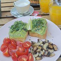 Avocado toast with extra tomatoes and mushrooms at Melt Cafe in Zagreb