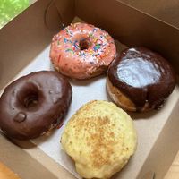 Chocolate frosted, strawberry frosted, Boston cream, peach cobbler  at bloomer's in Toronto