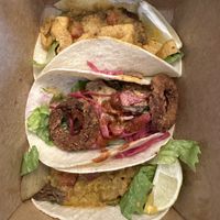 Top to Bottom: Roswell taco,  space cowboy taco, philluminati taco (my favorite)  at Burrito Burrito at Wizard Burger in Albany