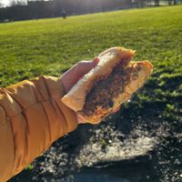 Haggis and egg, in the sun, on a bench.   at Black Rabbit in Edinburgh
