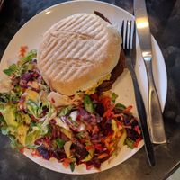 Egg & bacon roll with beet salad on the side at Black Rabbit in Edinburgh