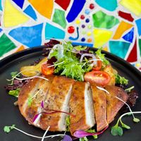 Meati Vegan & GF Chicken Cutlet with Roasted Fingerling Potatoes & a Mixed Green Salad. This was on a special "salad of the day." at Vin'tij in Miramar Beach
