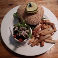 Black bean burger with vegan cheese at The Pink Bicycle in Victoria