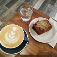 Latte and banana bread at The Fix Specialty Coffee in Madrid