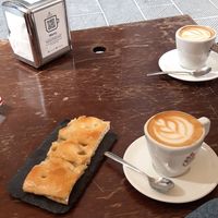 oat milk cappuccino and focaccia at Tazze Pazze in Genoa