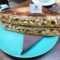 Sandwich with hummus, dried tomatoes and baked vegetables at Tazze Pazze in Genoa