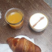 Vegan  croissant filled with apricot jam and vgsn chai latte at Tazze Pazze in Genoa