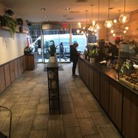 View of coffee shop from inside at Gregory's Coffee - 3rd Ave in New York City