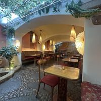 Underground seating area  at Maitrea in Prague