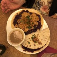 Lokše - potato pancakes with mock meat, cabbage and gravy  at Maitrea in Prague