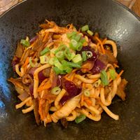 Kimchi udon noodles with grilled no-duck (365kč) at Maitrea in Prague