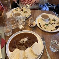 Czech goulash (bottom) and no-duck potato pancakes (top, right)  at Maitrea in Prague