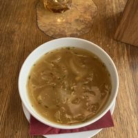 French onion soup with thyme   at Maitrea in Prague