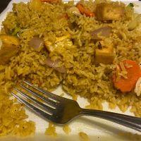 Vegan pineapple fried rice w added tofu & mixed vegetables. So good and such good portions  at Aroi Thai Food in Colorado Springs