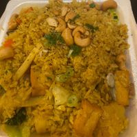 Vegan pineapple fried rice w added tofu & mixed vegetables. So good and such good portions  at Aroi Thai Food in Colorado Springs