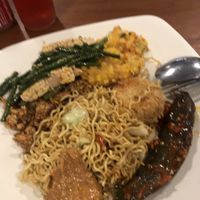 Sorry for the quality- there’s sweet tempeh, corn fritter, potato cake, mi goreng, long beans with tempeh and eggplant (spicy) cost 30K ($3AUD)  at Bu Mi in Canggu