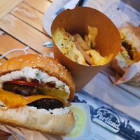 Tokyo Burger, cheesy fries, Barcelona burger in the background at Portland in Nantes