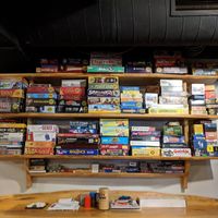 One section of their board games at One Well Brewing in Kalamazoo