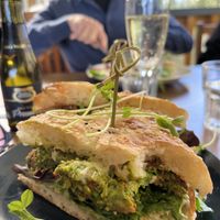 Crunchy chickpea burger on Turkish pide - all v🌱 🌱  at The Barn on Flaxton in Sunshine Coast