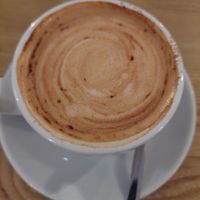 oat milk cappuccino at Fauna & Flora in Lisbon