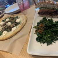 Veggie burger with kale salad (note that you’re vegan bc they normally put cheese on it) and mushroom/spinach pizza.   at True Food Kitchen in Jacksonville