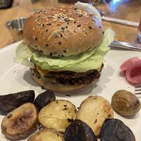 Portobello, beet, and walnut burger with fingerling potatoes.   at True Food Kitchen in Jacksonville