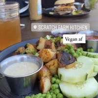 Hash with a side of Vegan Ranch & Beet Ketchup  // Cucumber with Sriracha sauce // Sassafrass lemonade  at Scratch Farm Kitchen in Lafayette