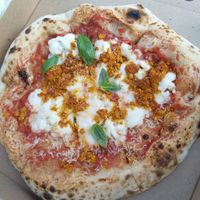 NoDuja: tomato sauce, homemade cashew mozzarella, homemade vegan 'Nduja, Gondino vegan parmesan & fresh basil. at Plant A Pizza in Ghent
