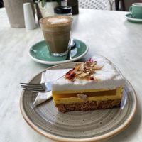 Cake & flat white with oat milk  at Home of Franziska in Budapest