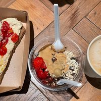 Hummus Toast, Cacao-Peanutbutter-bowl, Oat Cappuccino  at Base V Juicery - Via dei Neri in Florence