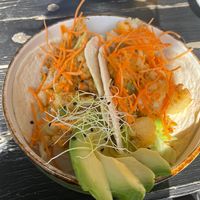 Wrap, stuffed with seasoned cauliflower, 'coleslaw', avocado and a delicious sauce. at Het Koffiepand in Middelburg
