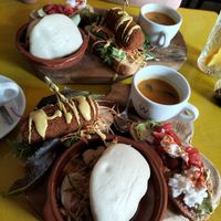 Lunch plate (soup, avocado toast with vegan feta, croquettes, bao bun) at Het Koffiepand in Middelburg