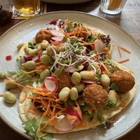 Flatbread with parsnip balls, radishes and green beans  at Het Koffiepand in Middelburg