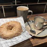 Vegan peanut butter ring doughnut and Earl Grey tea with oat milk  at Tantrum Doughnuts in Glasgow