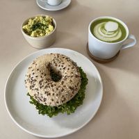 Matcha latte with scrambled tofu and bagel   at Plant Base in Berlin