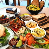 Salmon bagel, breakfast plate for 2, bounty cake at Plant Base in Berlin