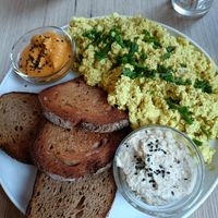 Tofu scramble with extra bread and dips (option 2 on menu) at Plant Base in Berlin