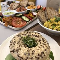 Breakfast plated and egg bagel at Plant Base in Berlin