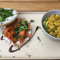 Salmon bagel with a side of tofu scramble at Plant Base in Berlin