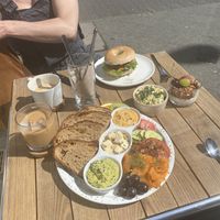 Breakfast plate and cream cheese bagel at Plant Base in Berlin