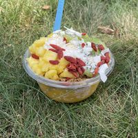 Mango glow bowl without honey and subbed GF/vegan granola  at Playa Bowls in Brighton