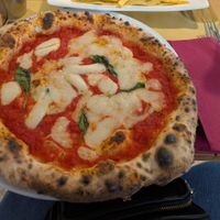 Vegan margarita with vegan cheese. Delicious 😋 at Rossopomodoro in Rome