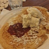 Vegan waffle with strawberry jam and vanilla ice cream. at Klockargårdens Våffleri in Grodinge