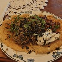 Vegan japanese waffle with chickpeas, mushrooms, ruccola, quinoa and creme fraiche. at Klockargårdens Våffleri in Grodinge