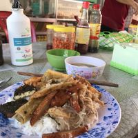 Plate with rice and selection of meats and tofu. Comes with a soup at Quan Thien Phuc - Maybe closed in Phu Quoc