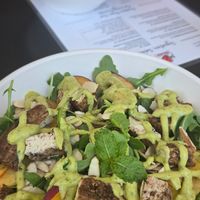 Weekly special which was arugala, peaches, almonds slivers, mint and green goddess dressing. I paid extra for added tofu at MV Salads in Oak Bluffs